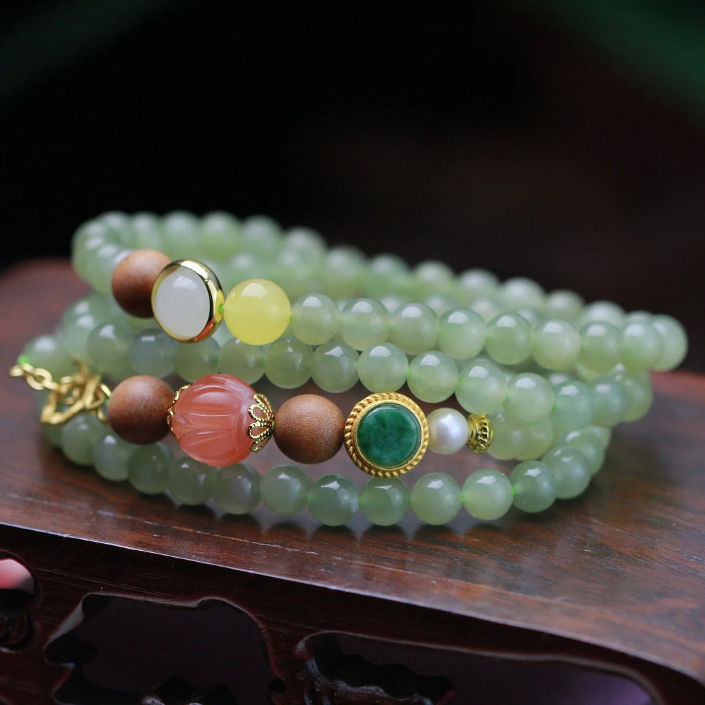 Natural Hetian jade and red lotus beads necklace and bracelet set with white sandalwood and beeswax.