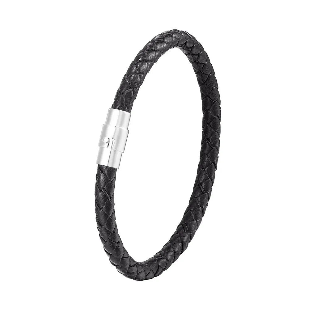 Geometric titanium steel wire bracelet with hidden magnetic clasp on a wrist, showing matte grey finish.