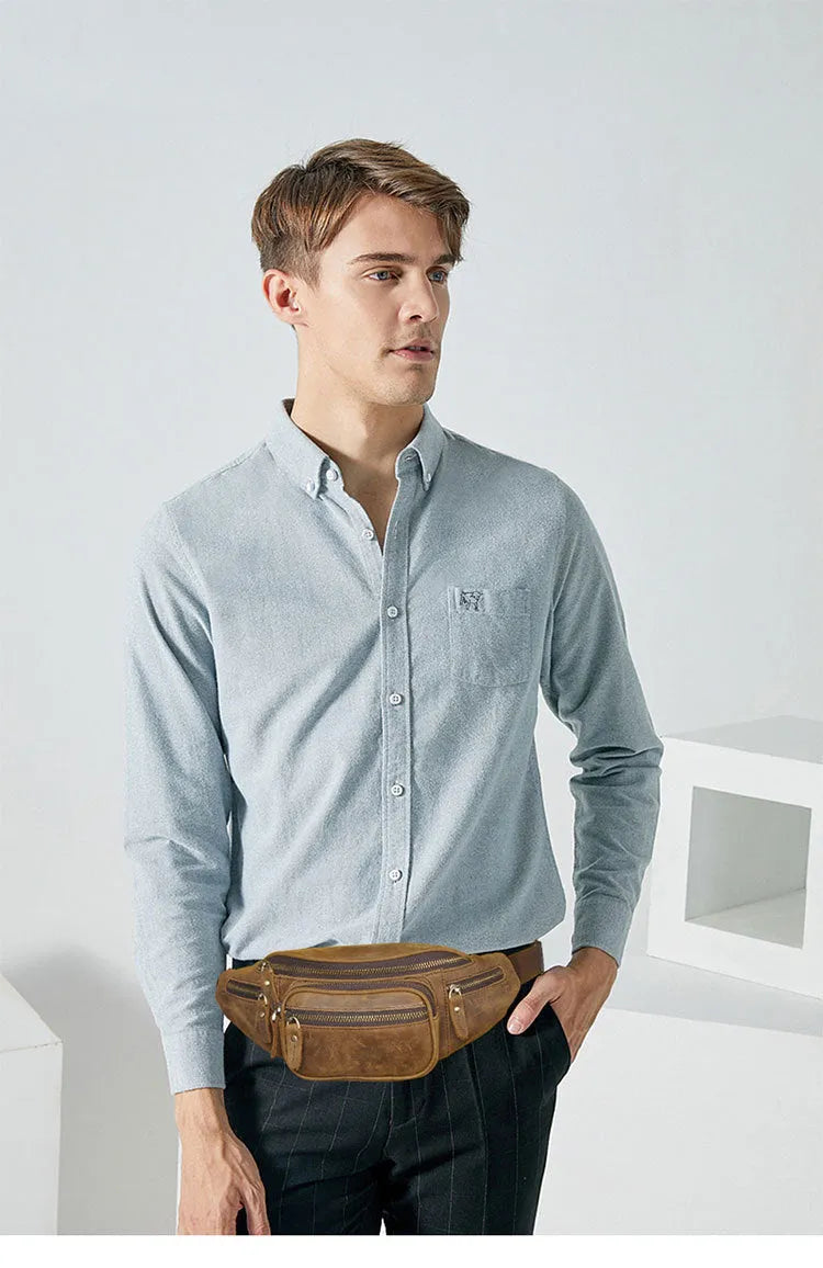 Brown leather shoulder messenger bag with single strap showing interior polyester cotton lining