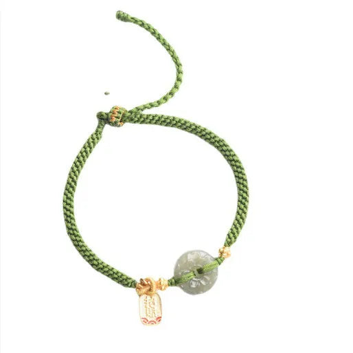 Green rope bracelet with Hetian jade peace buckle fastener, traditional Chinese hand-woven construction
