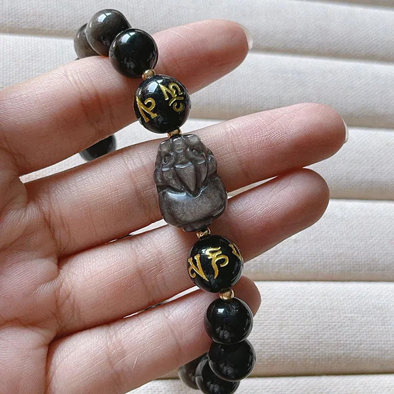 Men's silverstone bracelet with beadwork featuring Chinese proverbs, on a wrist.