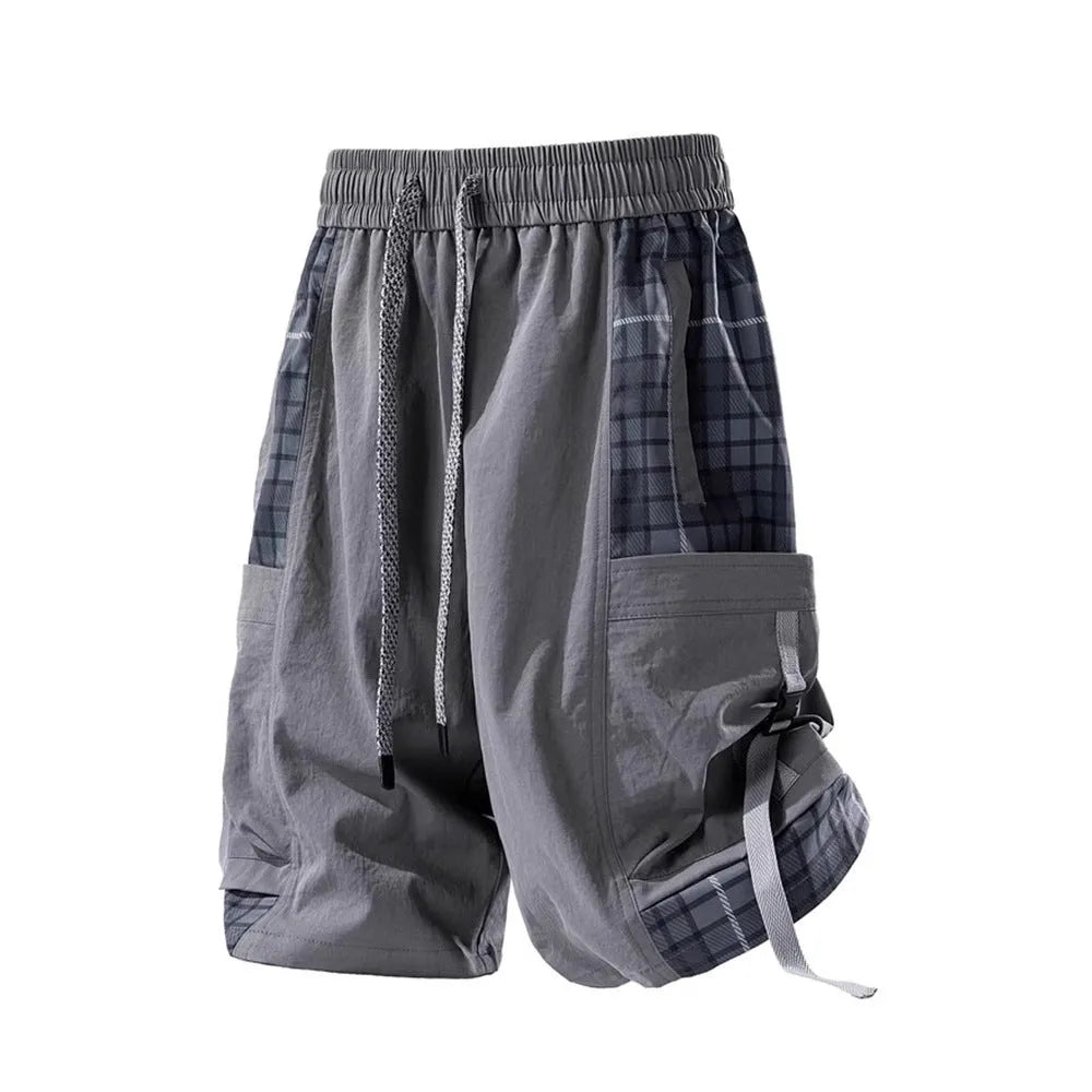 Men's casual cargo shorts with plaid stitching detail in loose fit design