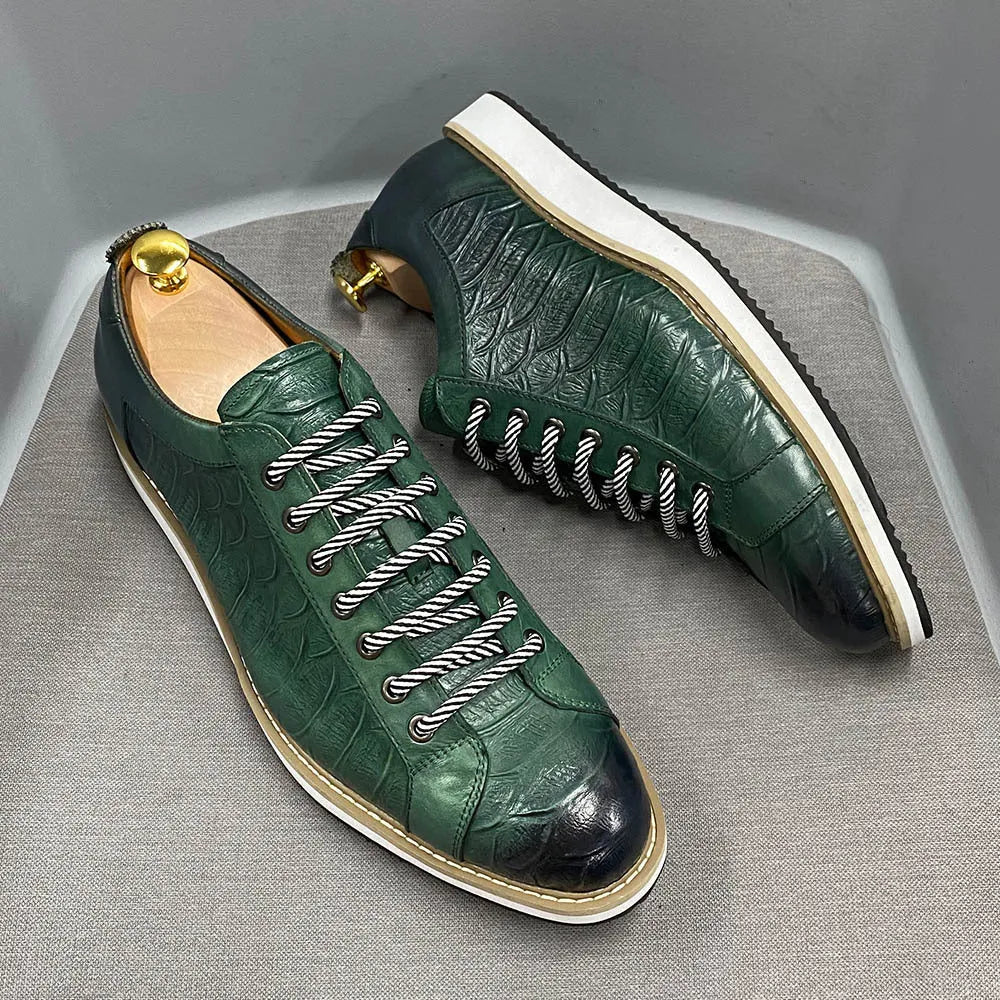Men's low-top white shoes with embossed pattern texture on the front, featuring front-tie laces.