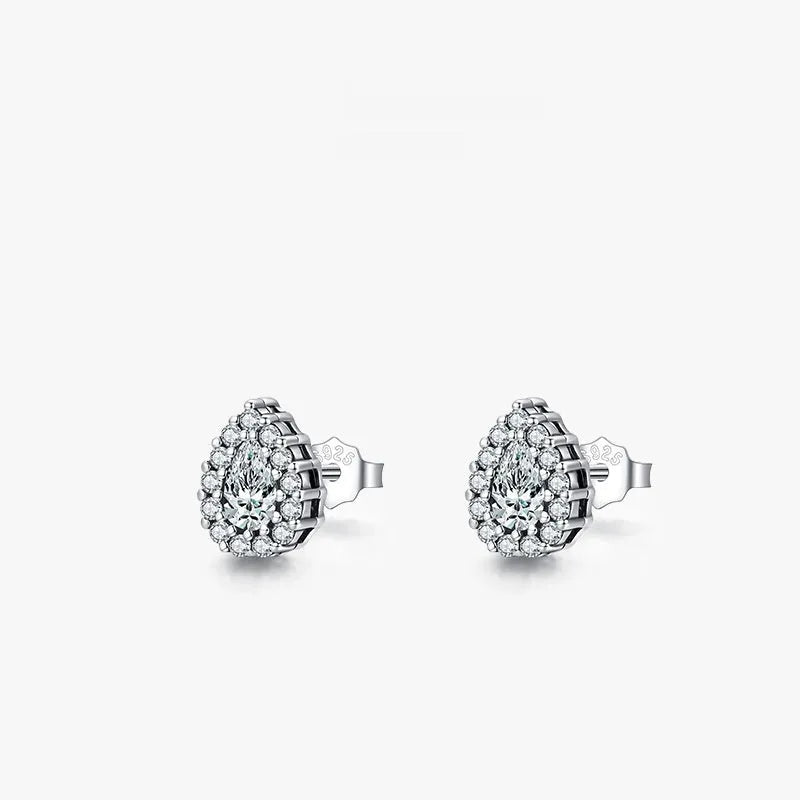 A pair of women's silver drop ear studs made from 925 sterling silver with a teardrop shape.