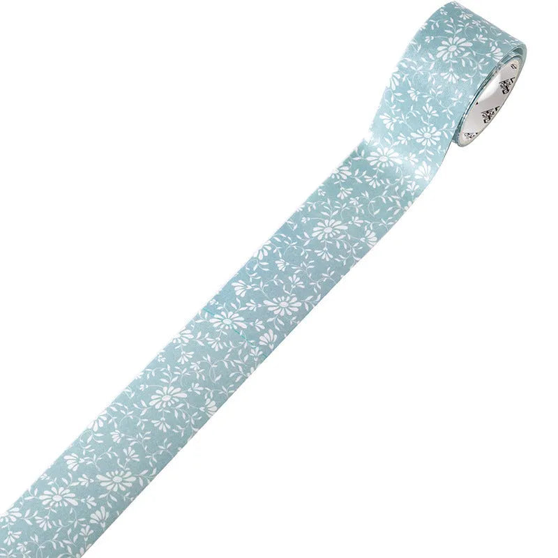 Roll of Japanese paper floral washi tape with vintage watercolour designs for journaling and craft projects