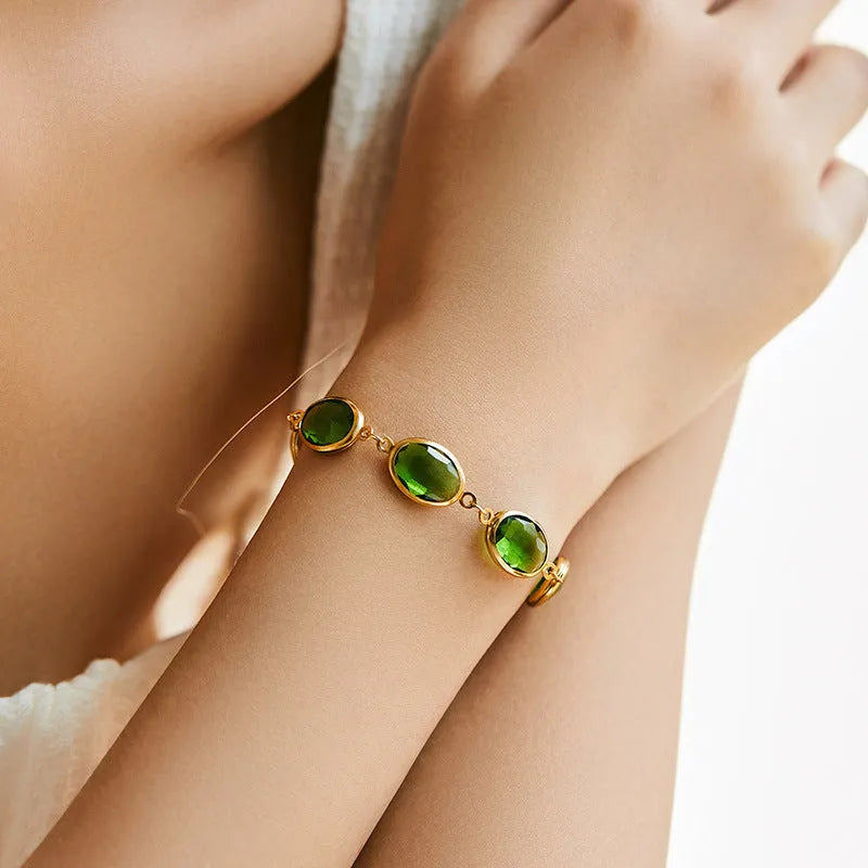 Women's geometric ellipse bracelet with glass inlay accents on copper base in blue, green, and multicolor options