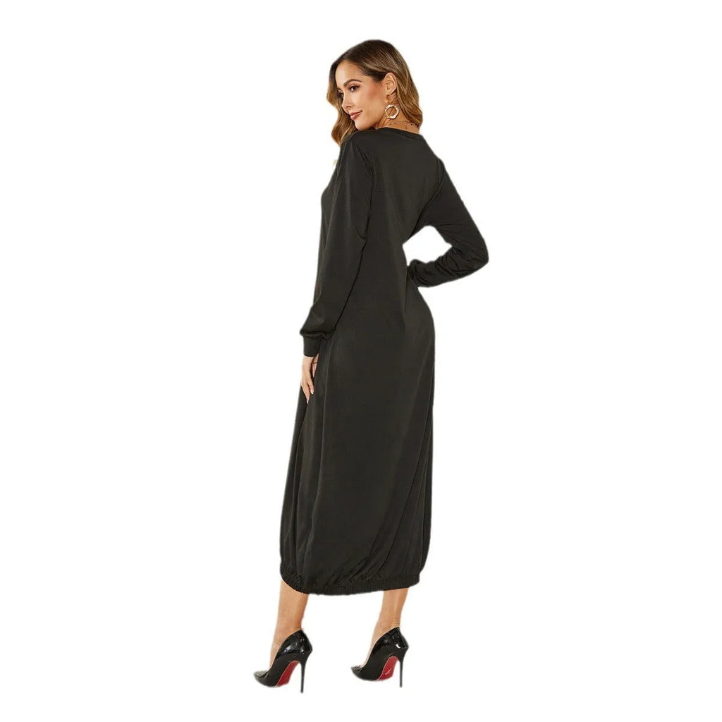 A loose-fitting black lantern dress for women with a lace-up crew neck.