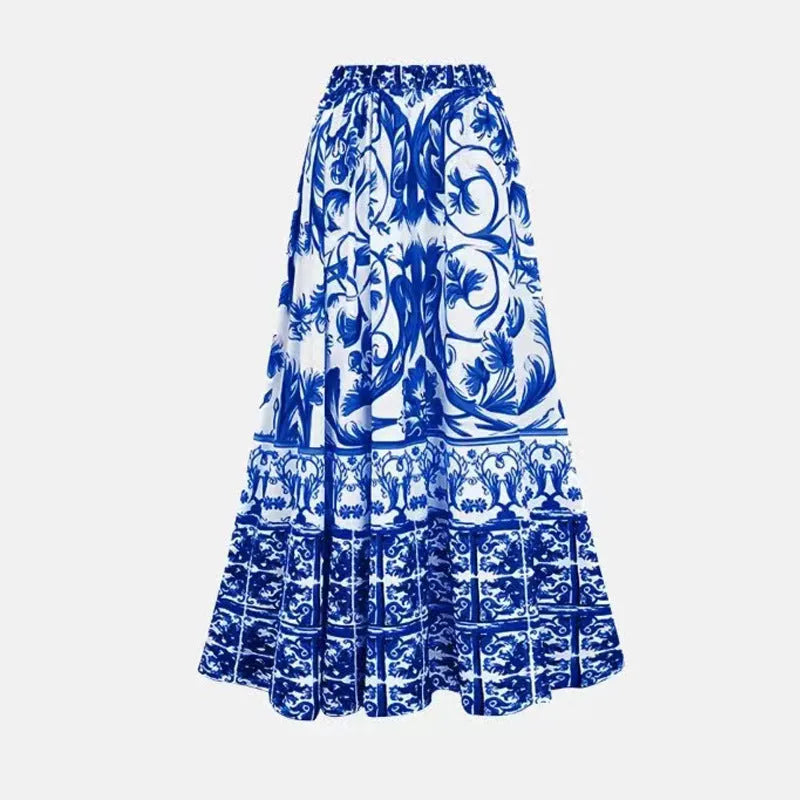 Women's floral printed one-piece polyester swimsuit on a hanger, showing skirted style.