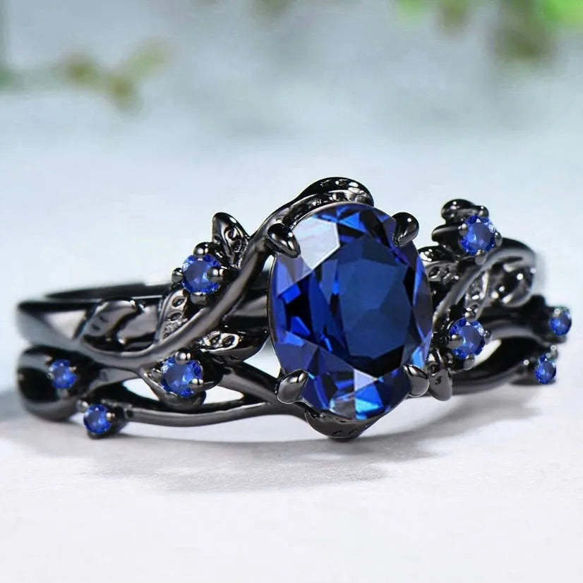 Women's gun black geometric ring with navy blue rhinestone decoration on copper base