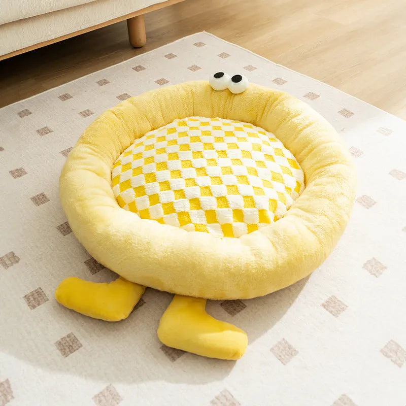 Briquettes plush pet bed in blue colour with raised sides forming a nest for dogs or cats