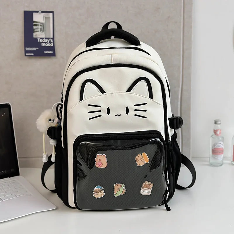 Korean cartoon backpack in multiple colours with curved shoulder straps and badge pendant options