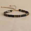 Geometric pull beads bracelet in glass or coloured glaze with round elements
