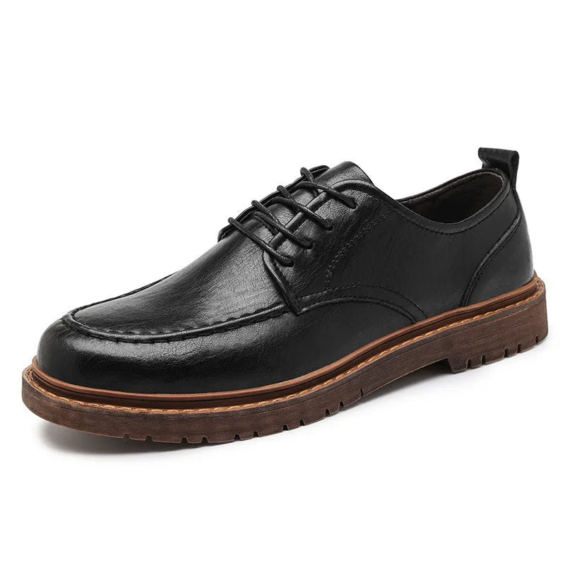 Men's black and brown British-style casual leather shoes with round toe and flat rubber sole.