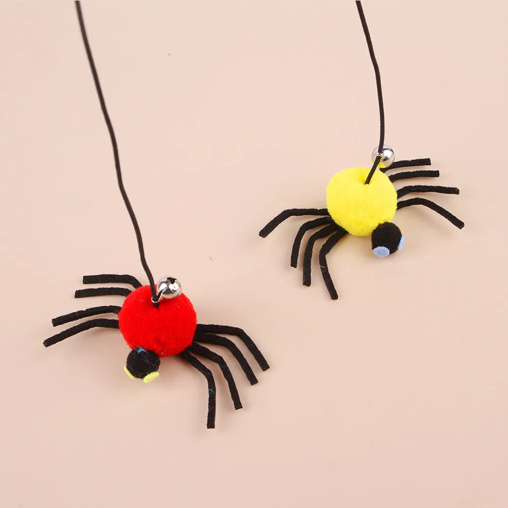 Red or yellow cat toy hanging from door with elastic rope, feathers, bells and spider attachment