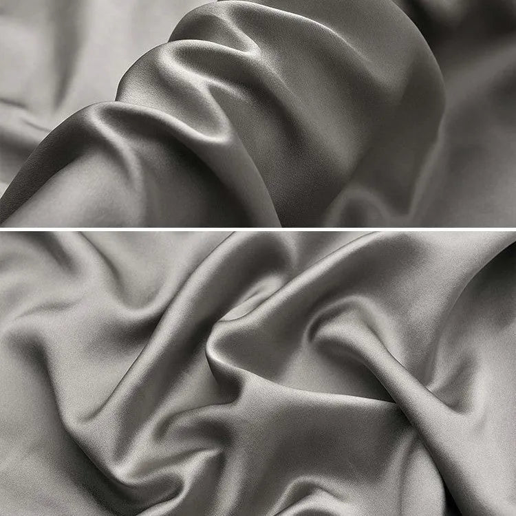 Dark grey mulberry silk envelope pillowcase showing plain weave texture and overlap closure