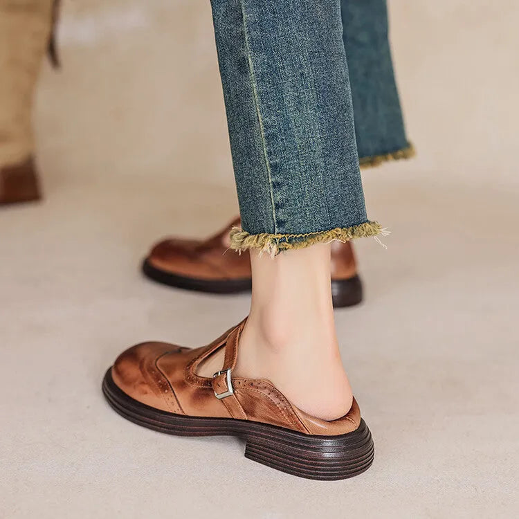 Women's brown sheepskin leather flat shoes with round toe design showing UK size label
