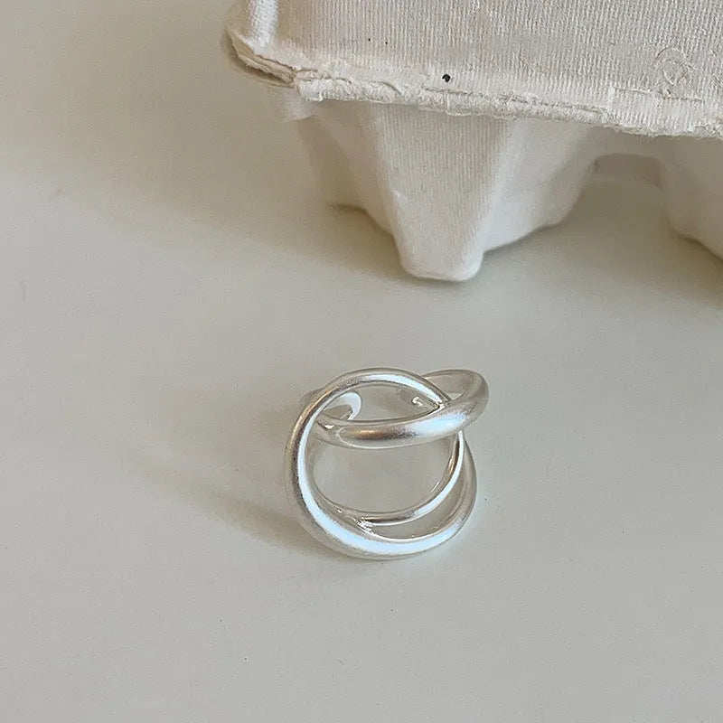 Three-dimensional interlaced matte metal open ring for women in geometric design