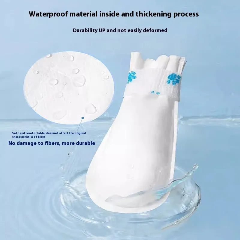 White disposable waterproof shoe covers for dogs in S and M sizes with non-slip feature