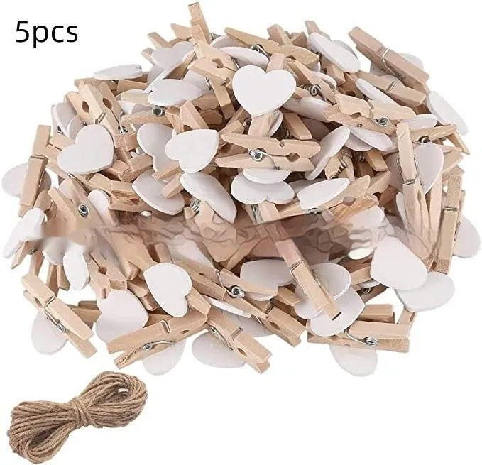 Set of five solid wood heart-shaped hair clips in red, white, and rose red on a plain background.