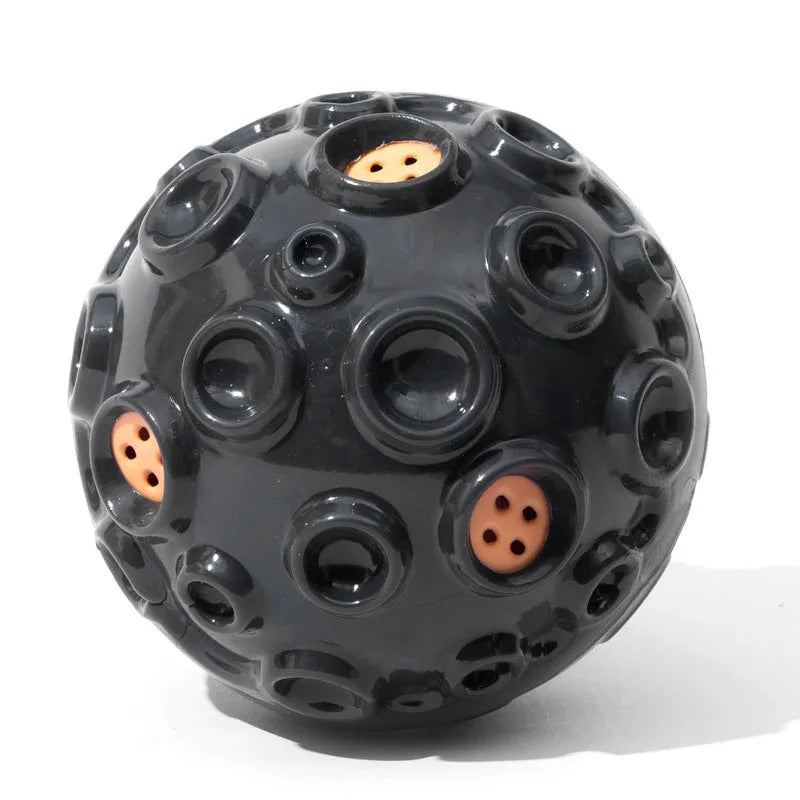 Durable rubber dog chew ball in multiple colours with squeaky sound and teeth-cleaning bumps.
