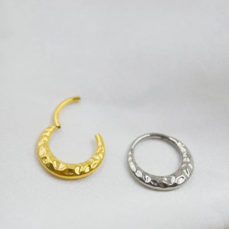 Titanium alloy ASTM F136 concave-convex carved nose ring in gold or silver colour.
