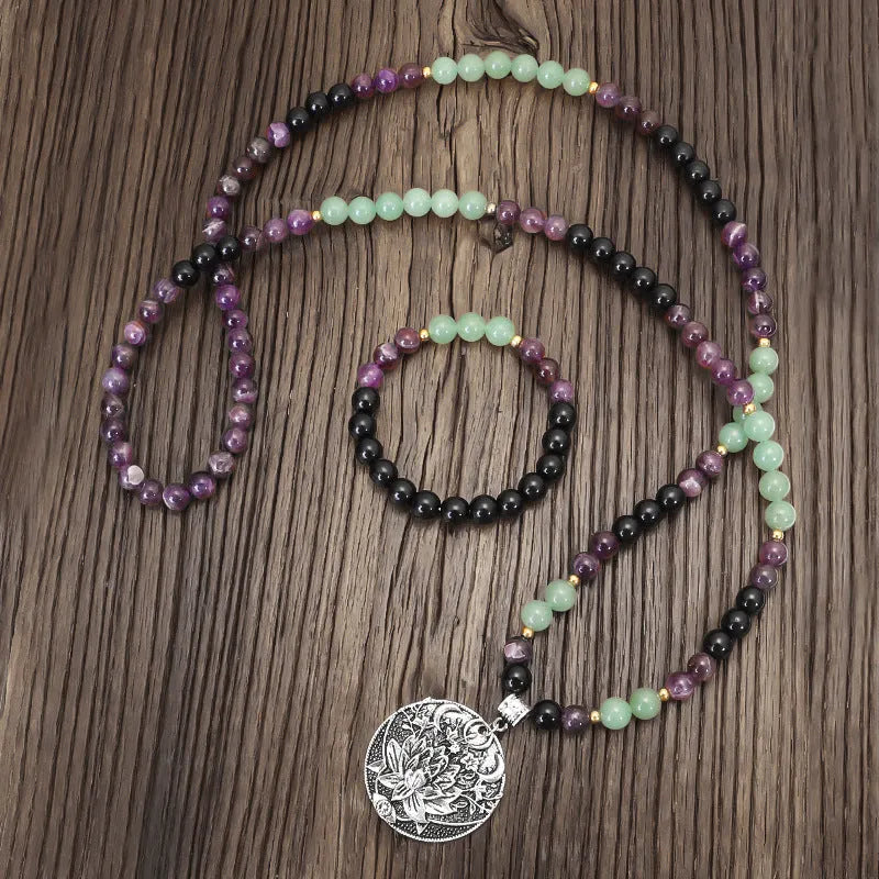 Dongling long necklace with geometric lotus pendant and adjustable cord alongside matching bracelet
