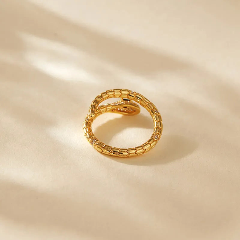 Adjustable copper snake ring with gold colour plating in KR0201.