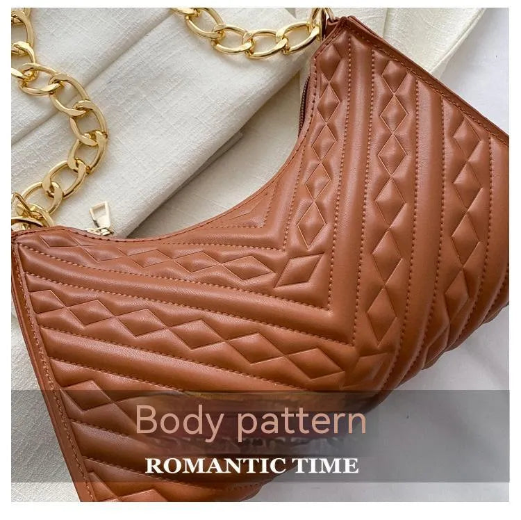 Brown pleated PU chain baguette shoulder bag showing square shape and soft handles.
