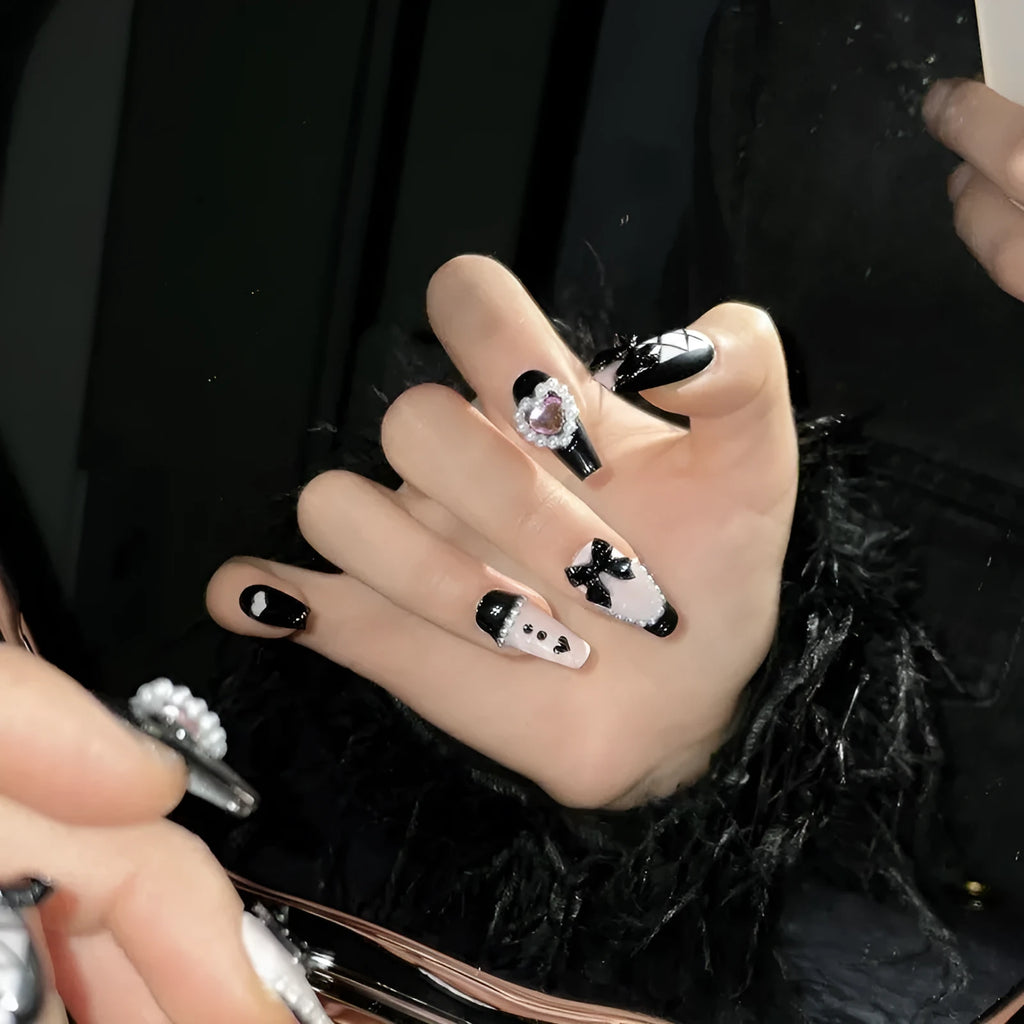Hand-painted black pink heart and bow pattern cat's eye artificial nails in four sizes