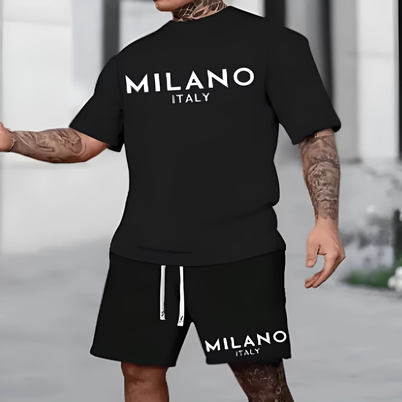 European style men's short sleeve polyester suit set with round neck top and matching shorts in multiple colours