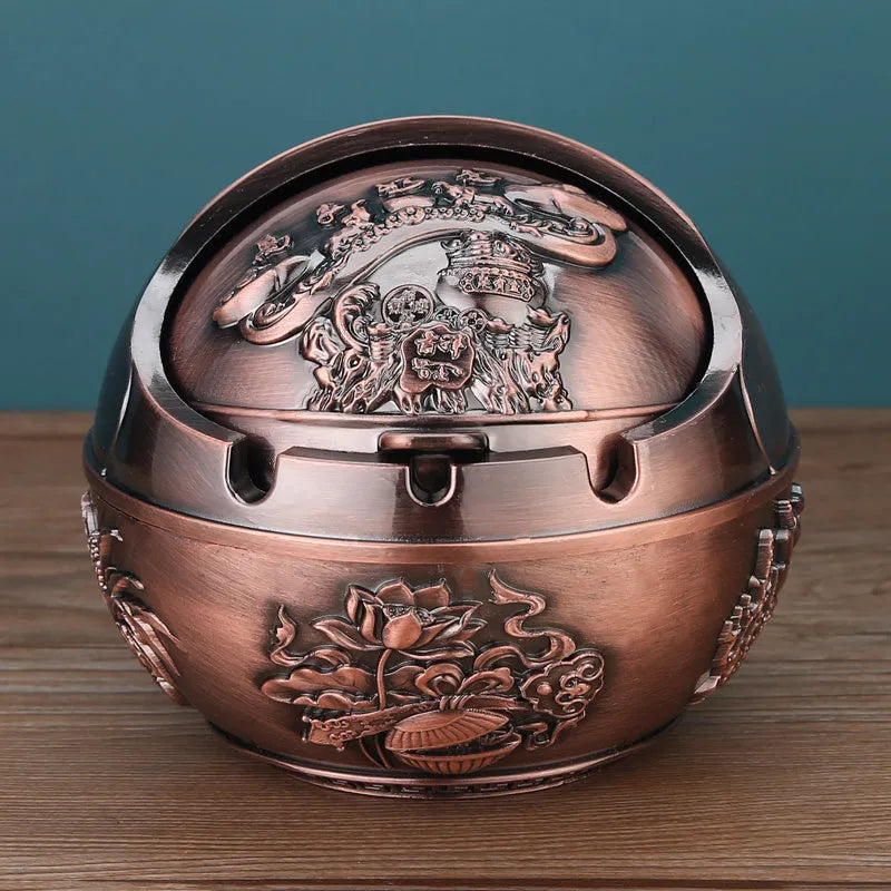 Bronze alloy ashtray with decorative fortune tree design and smoke extinguishing slot.