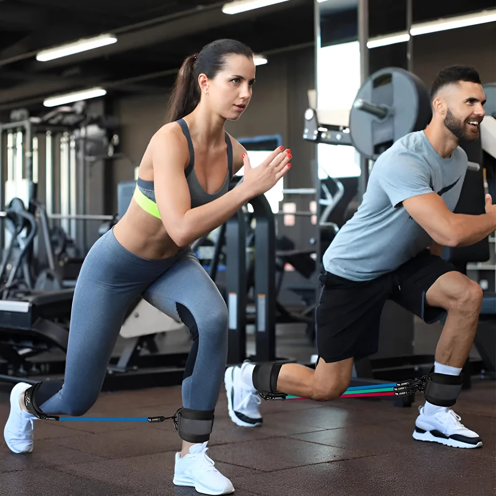 Set of three TPE resistance bands in 10, 20, and 30 pound resistances with two black ankle foot loops and a storage bag.