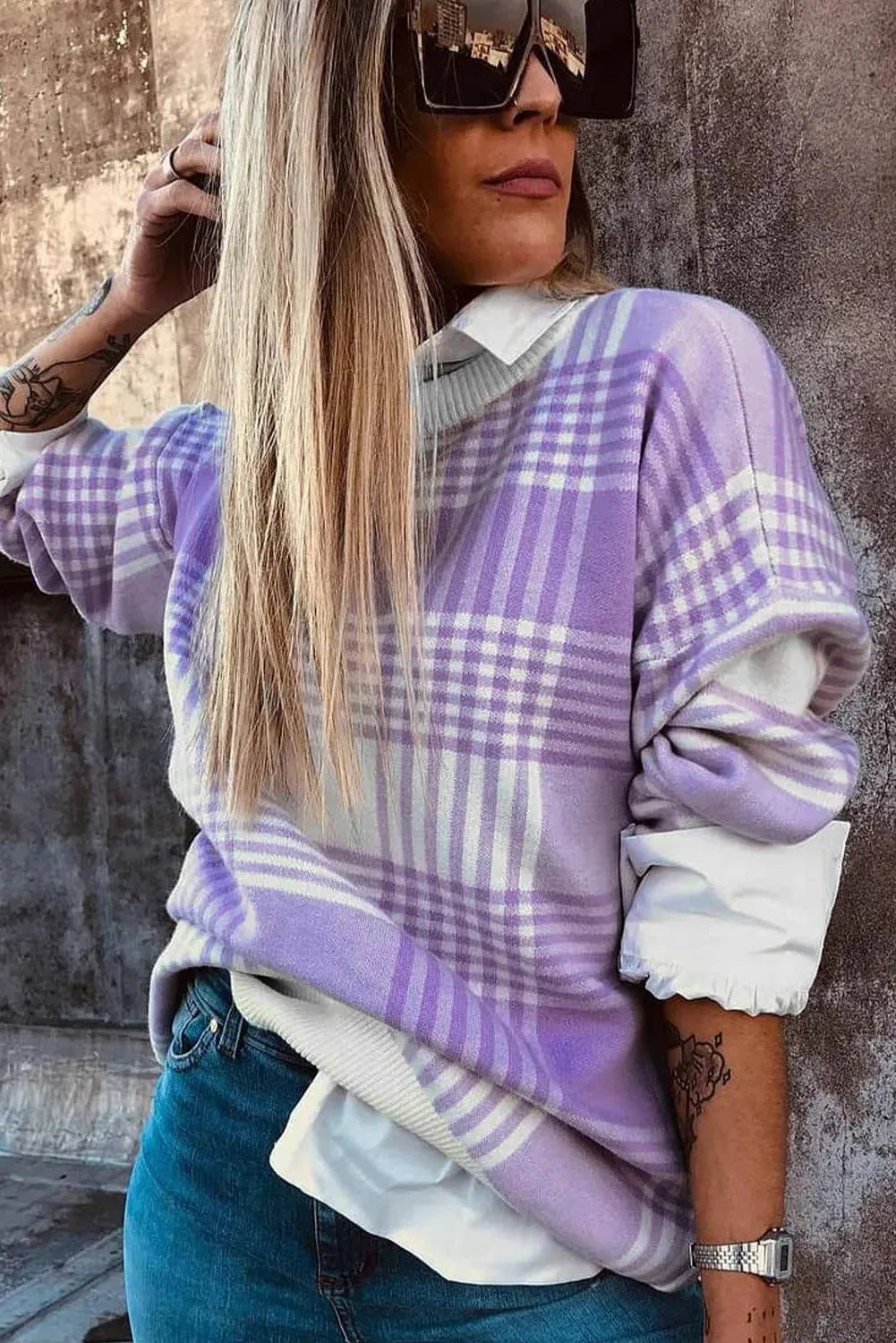 Lilac plaid print loose long-sleeve sweater with ribbed trim on mannequin.