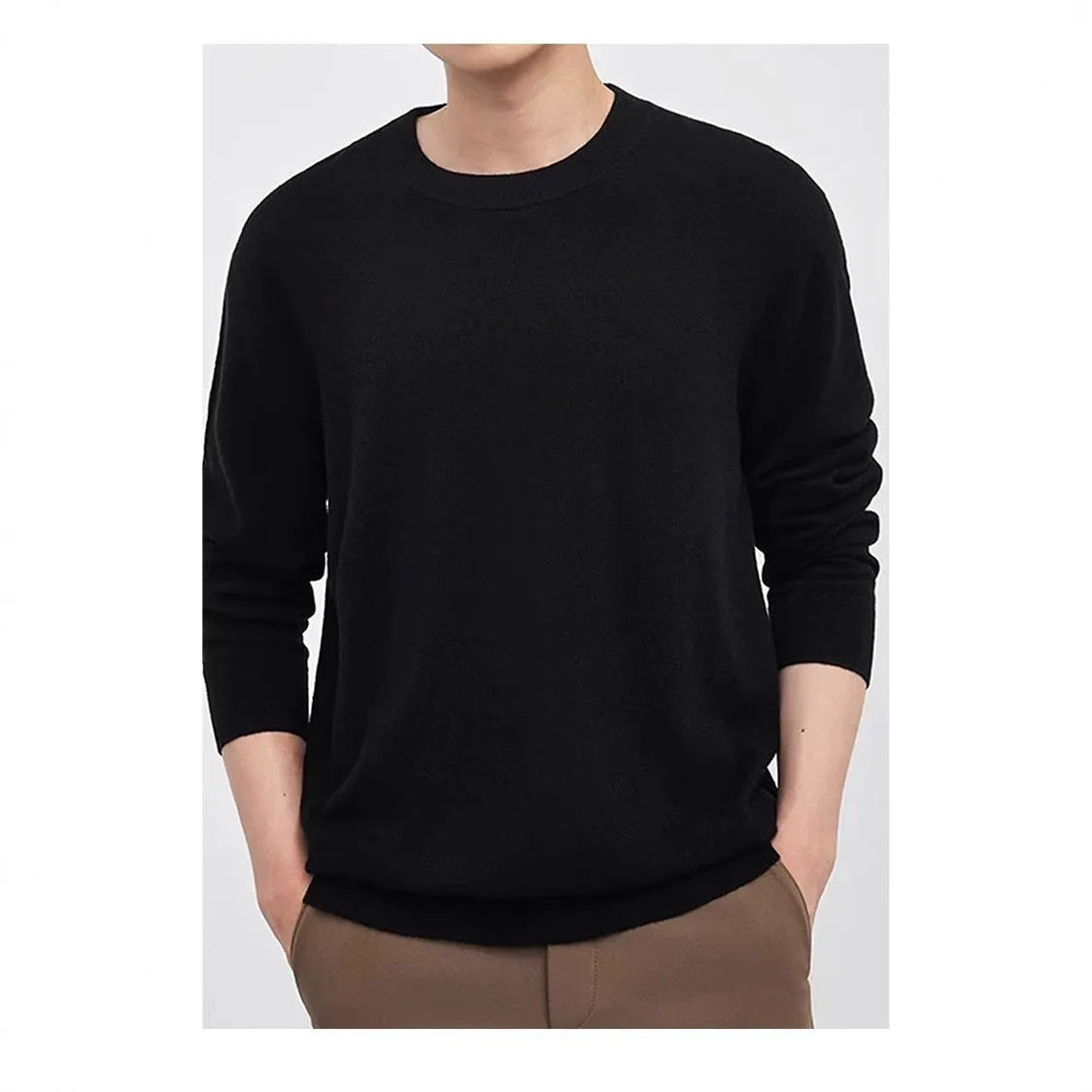 Man wearing a standard wool pullover sweater in light grey, regular fit, for autumn and winter.
