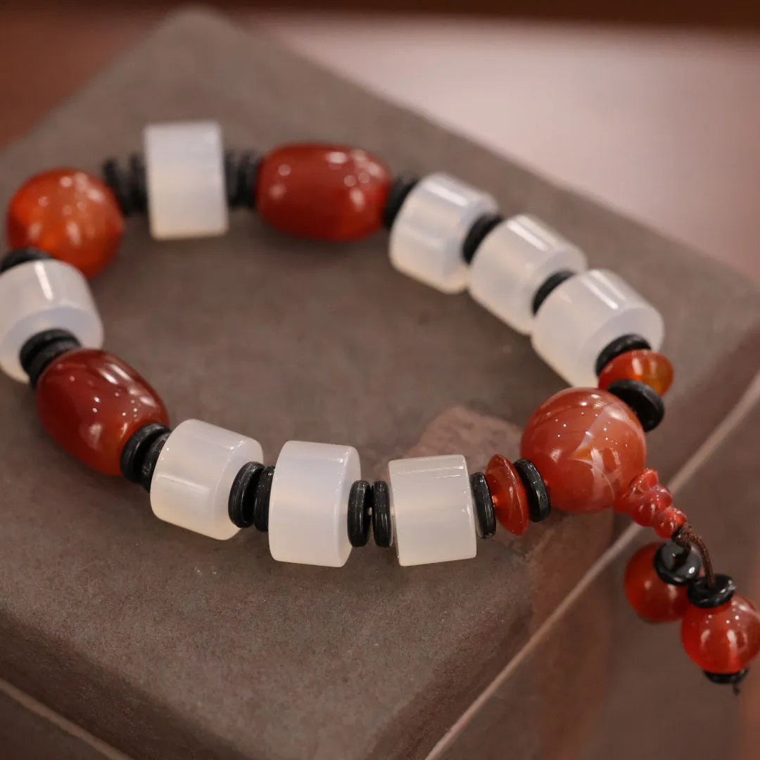 Natural agate bracelet with sardonyx, white, red, and black agate beads in geometric ethnic design