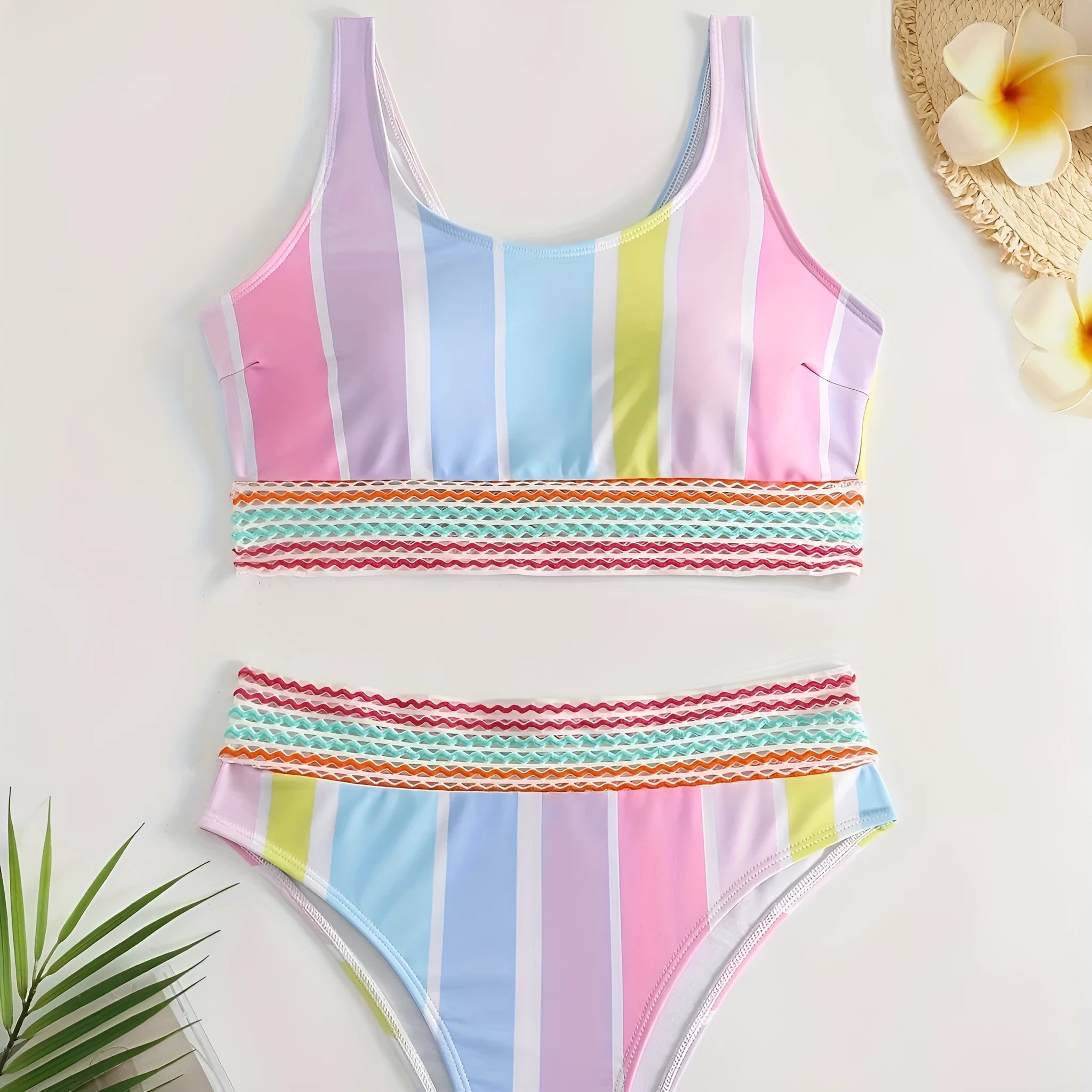 Women's striped two-piece bikini on a hanger, showing sporty briefs with spandex lining and matching top.