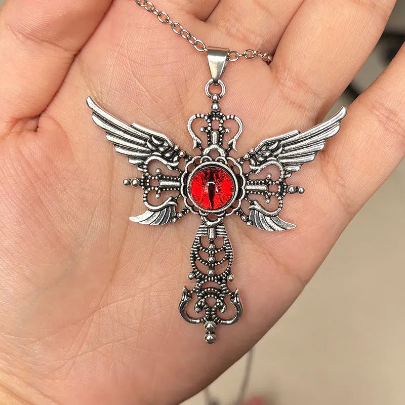 Geometric devil wings and cross alloy pendant necklace in blue on a silver chain.