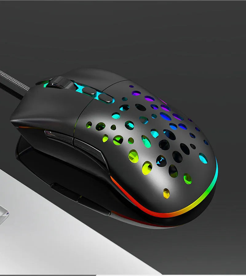 M88 hollow wired and wireless gaming mouse with perforated shell and USB cable on desk