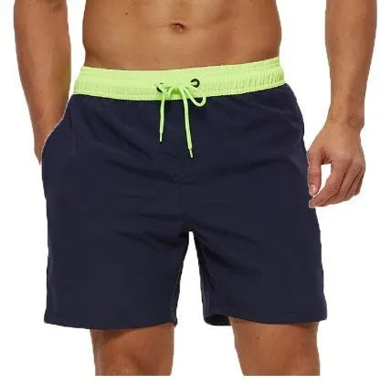 Men's blue fitness shorts with a drawstring waistband and a side zipper pocket.