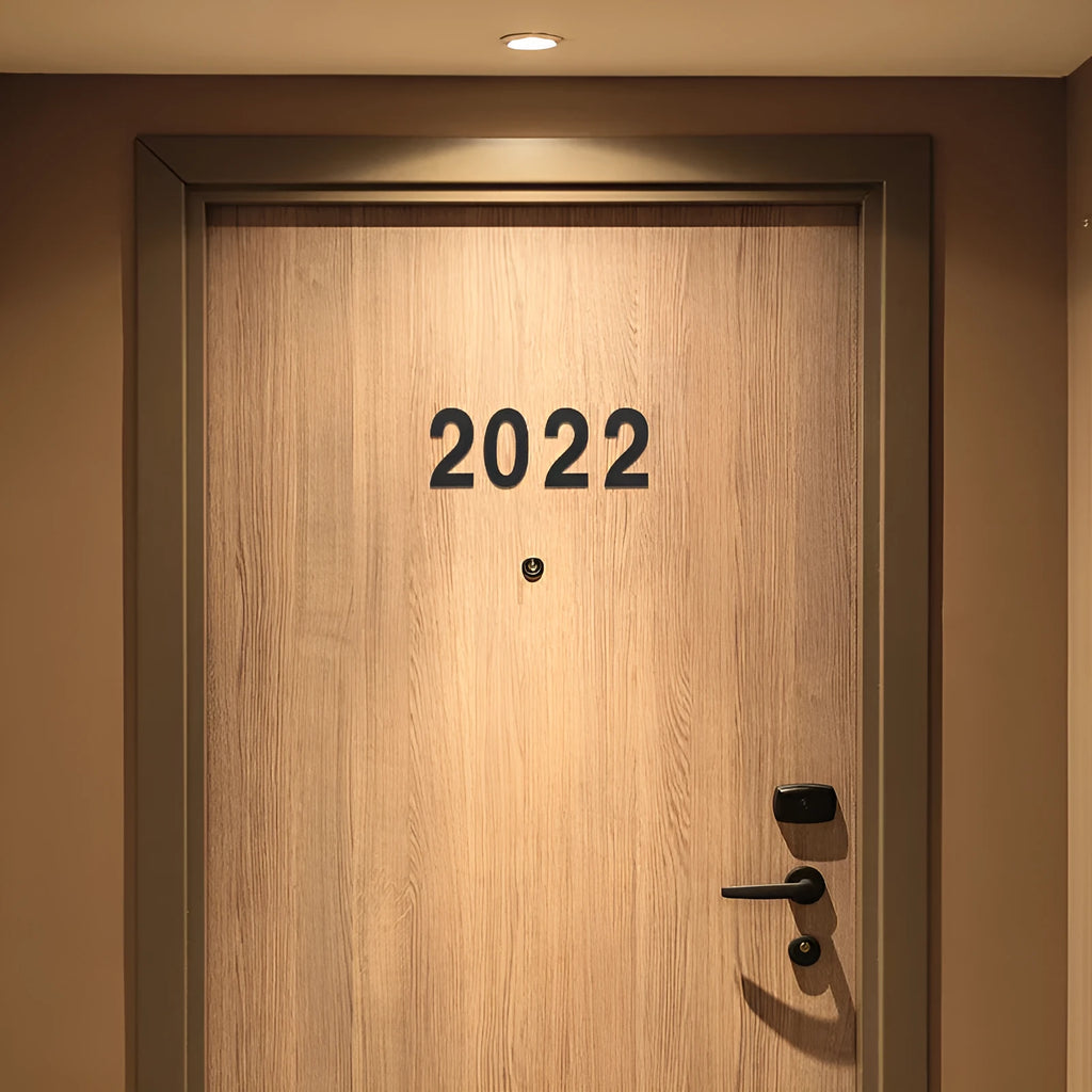 Black stainless steel sticky house numbers showing 7.5cm characters including letters and digits