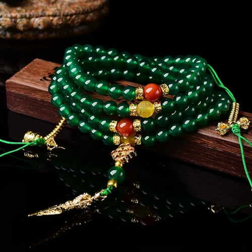 Handmade multi-circle bracelet with natural green agate beads from Brazil.