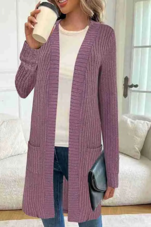 Long sleeve loose cardigan jacket in black, wine red, or grey with pockets, shown on a hanger.