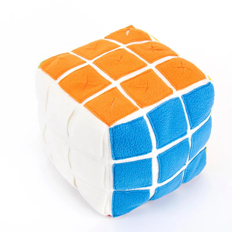 Pet Rubik's Cube sniffing toy in polar fleece fabric with treats visible, 15cm cube on a light background