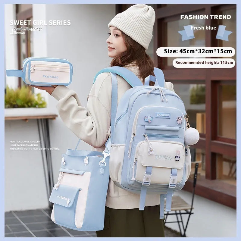 Pink waterproof Oxford cloth school backpack for girls with curved shoulder straps.
