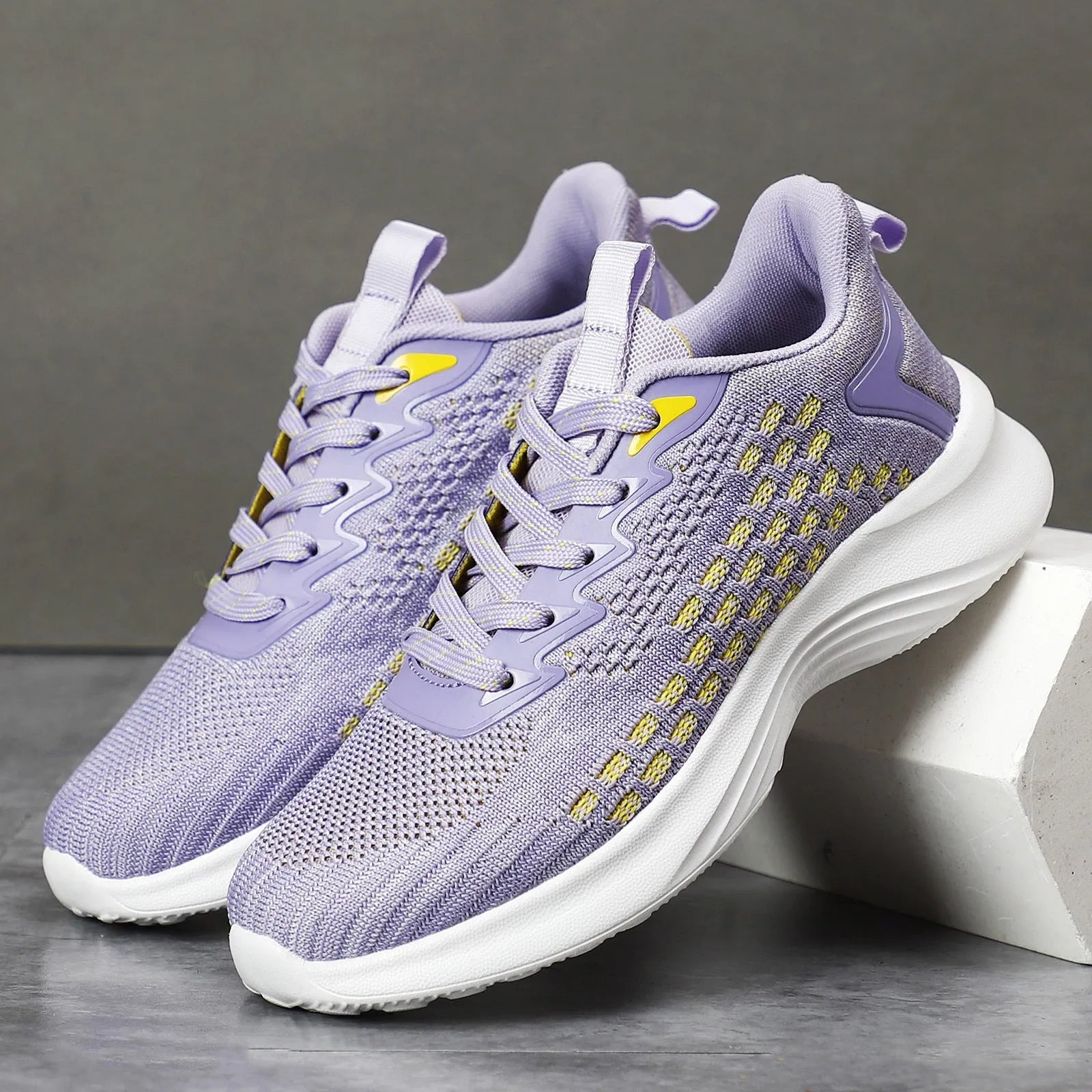 Women's Lavender Purple Flyknit running shoes with striped mesh design and EVA sole