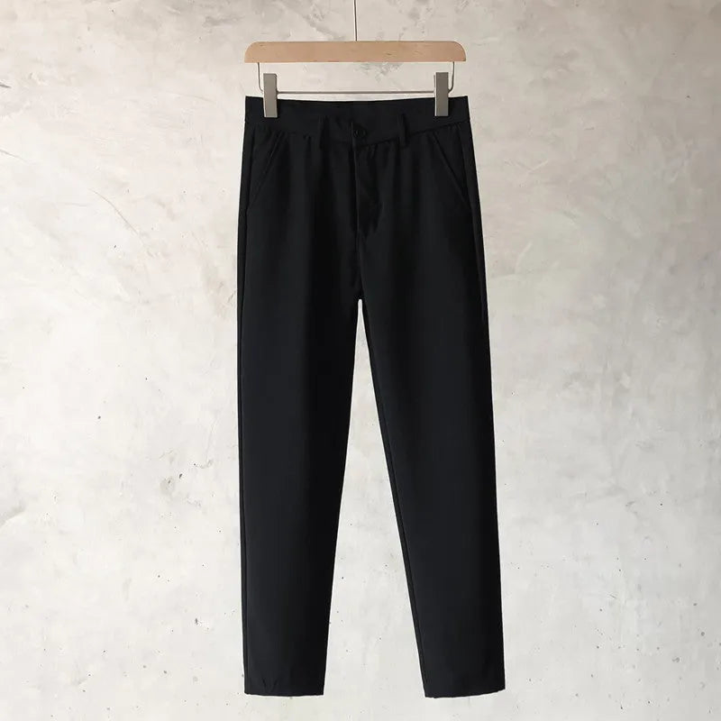 Boys slim straight wool trousers with tapered fit and belt loops in business casual styling