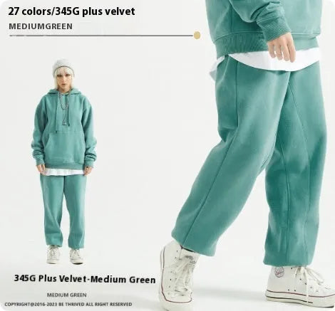 Men's solid colour cotton velvet sweatpants with elastic waist and ankle banding detail