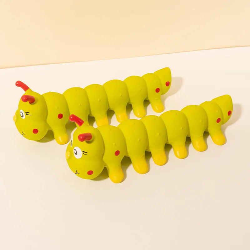 Yellow caterpillar-shaped rubber dog squeaky toy for small and medium dogs.