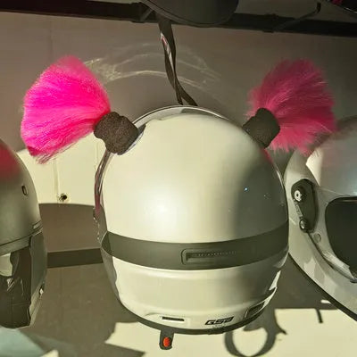 Close-up of black skyhigh braid decorative balls attached to a motorcycle helmet, showing 8cm height