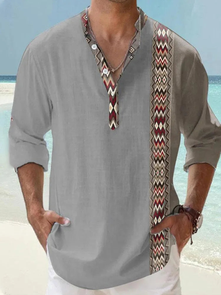 Man wearing a thin, striped long sleeve Hawaiian-style casual shirt in lilac.